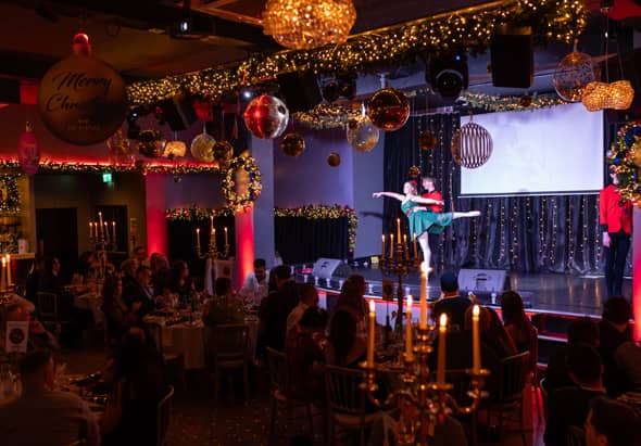 Guests watching a Christmas show at the Bentley Liverpool.